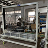 Automatic fabric loading machine